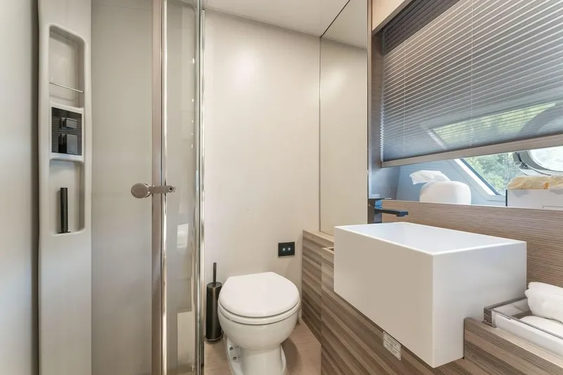Slide: The Image of Modern bathroom interior on 2020 Ferretti Yachts 670, featuring sleek design and fixtures. - 64
