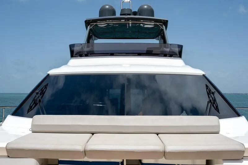 Slide: The Image of 2020 Ferretti Yachts 670 with sleek design and spacious deck seating. - 13