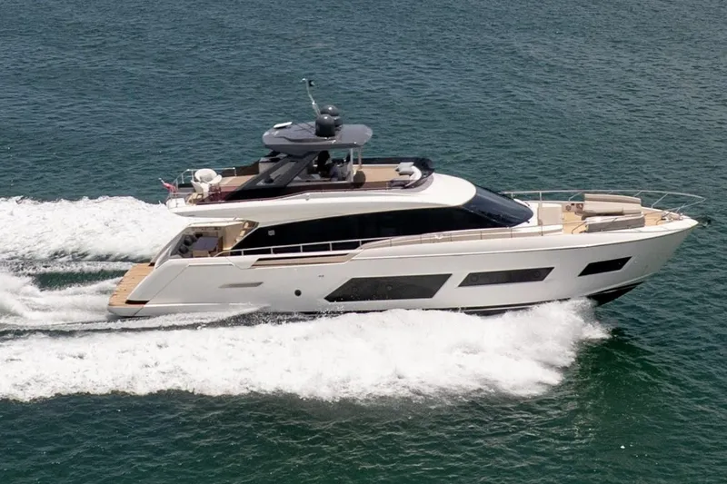 The Image of 2020 Ferretti Yachts 670 cruising on open water, showcasing sleek design and luxury. - 1