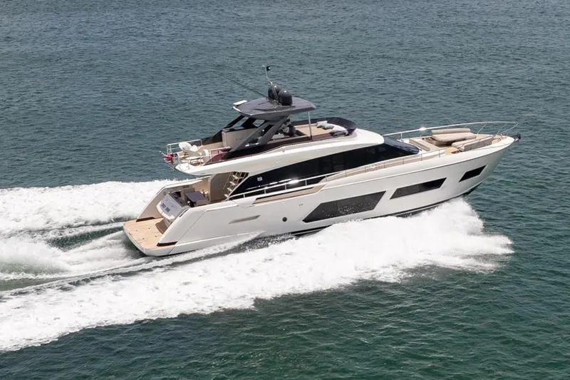 Slide: The Image of 2020 Ferretti Yachts 670 cruising on open water, showcasing sleek design and luxury features. - 2
