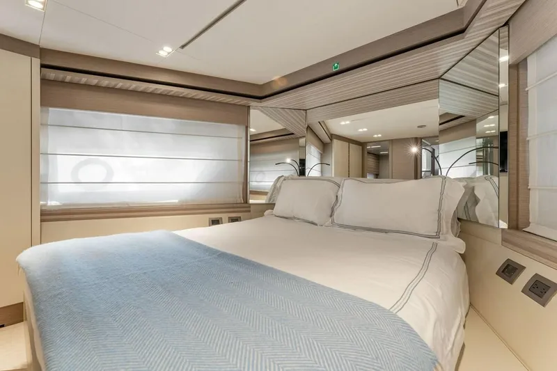 Slide: The Image of Luxurious bedroom interior of 2020 Ferretti Yachts 670 with elegant bedding and modern design. - 58