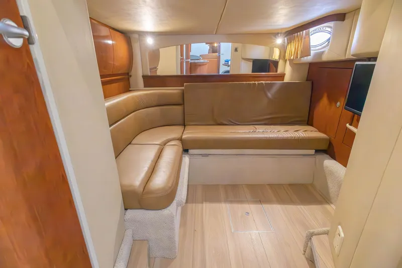 Slide: The Image of Luxurious interior of 2005 Sea Ray 420 Sundancer yacht with leather seating. - 24