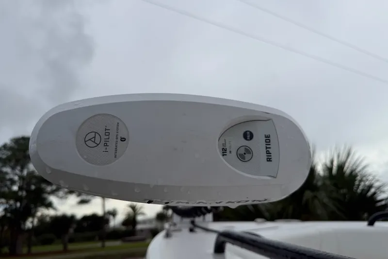 Slide: The Image of Close-up of i-Pilot Riptide system on 2022 Everglades 243 Center Console boat. - 14