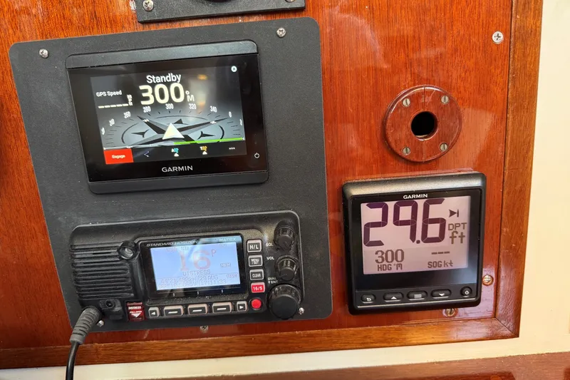 Slide: The Image of Hinckley Sou'wester 42 (1984) navigation panel with Garmin GPS and marine radio. - 31