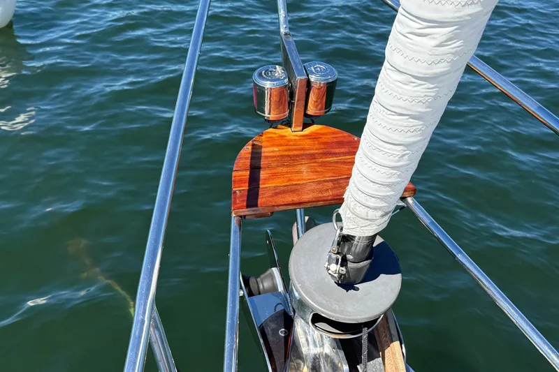 Slide: The Image of Bow of 1984 Hinckley Sou'wester 42 sailboat with polished wood and metal fittings. - 16