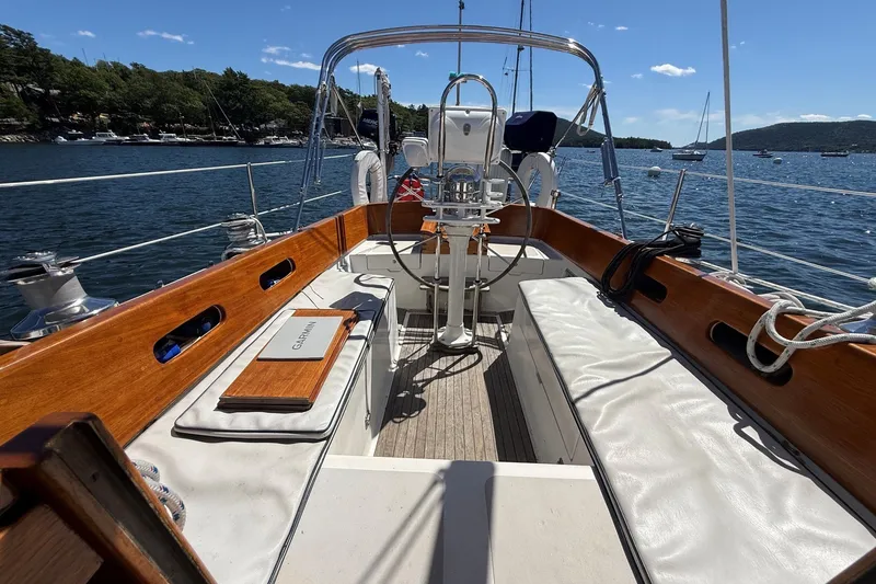 Slide: The Image of Hinckley Sou'wester 42 sailboat cockpit with wooden trim, on a sunny day, 1984 model. - 12