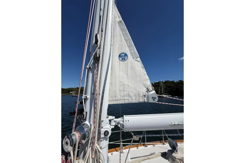 Slide: The Image of Sailboat mast and sail of 1984 Hinckley Sou'wester 42 on a sunny day. - 25