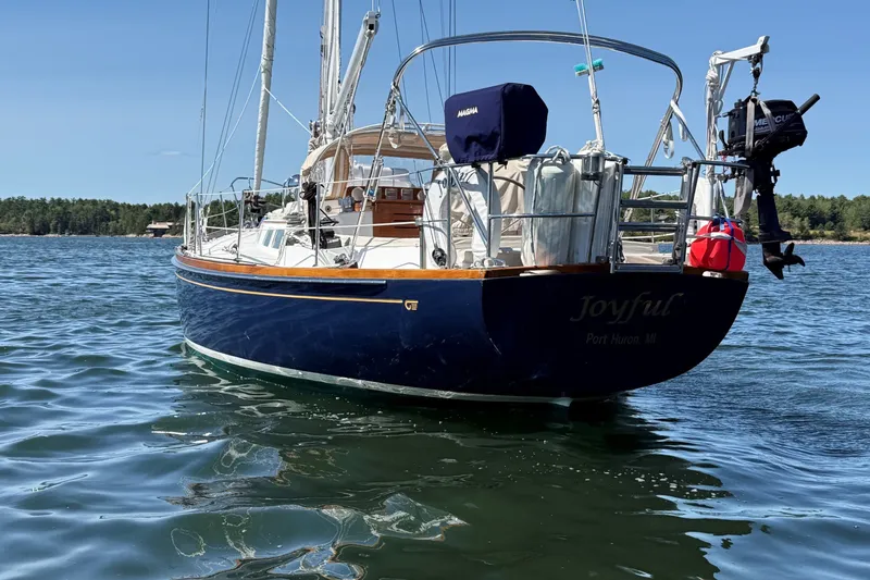 Slide: The Image of 1984 Hinckley Sou'wester 42 sailboat "Joyful" on calm water, Port Huron, MI. - 2