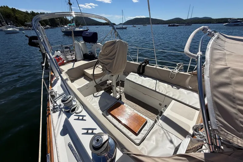Slide: The Image of 1984 Hinckley Sou'wester 42 sailboat cockpit with scenic harbor view. - 21