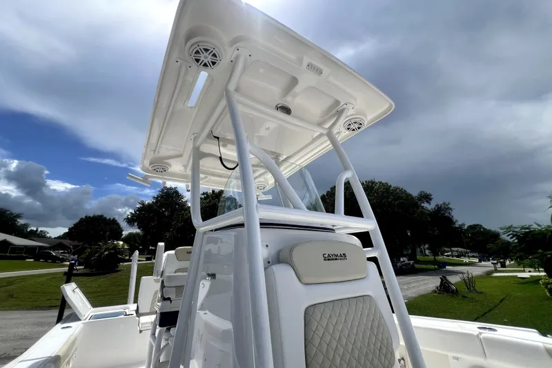 Slide: The Image of 2020 Caymas 26 HB boat with T-top under cloudy sky. - 47