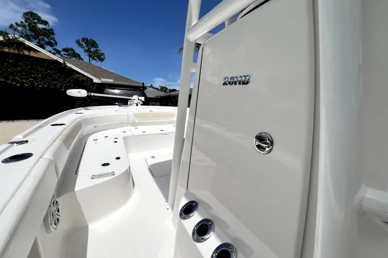 Slide: The Image of 2020 Caymas 26 HB boat deck with sleek white finish and modern design. - 70
