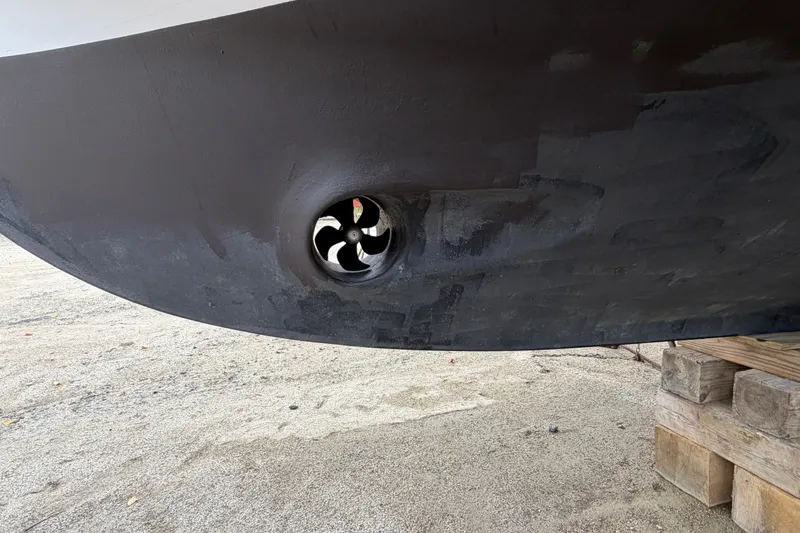 Slide: The Image of Bow thruster on a 2001 Nordic Tug 32 boat hull. - 25