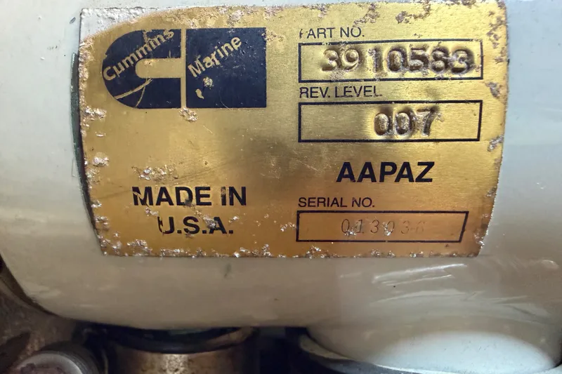 Slide: The Image of Cummins Marine engine plate on a 2001 Nordic Tug 32, made in the USA. - 83