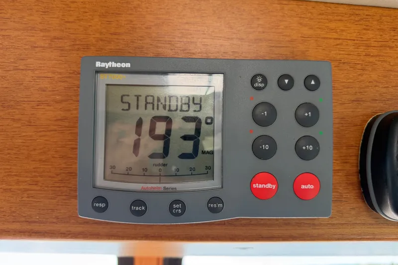 Slide: The Image of Raytheon ST7000+ autopilot display on 2001 Nordic Tug 32, showing standby mode at 193 degrees. - 52