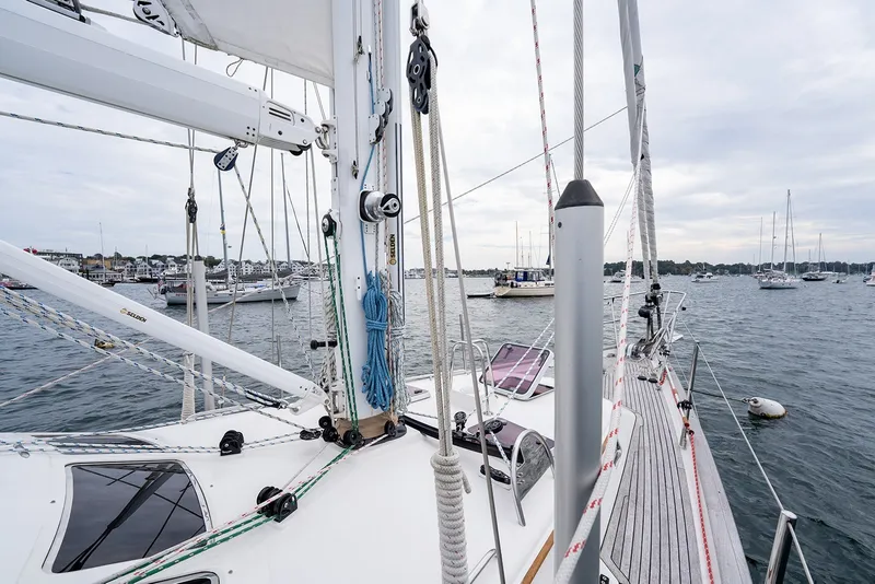 Slide: The Image of Sailboat deck view of 2008 Passport Vista 515 Center Cockpit in a marina setting. - 39
