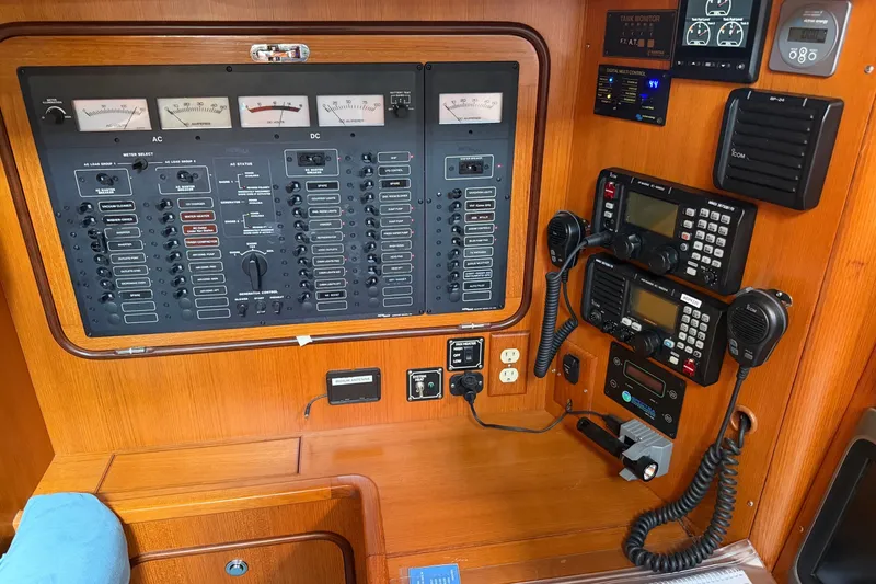 Slide: The Image of Control panel of a 2008 Passport Vista 515 Center Cockpit yacht, featuring navigation and communication equipment. - 14