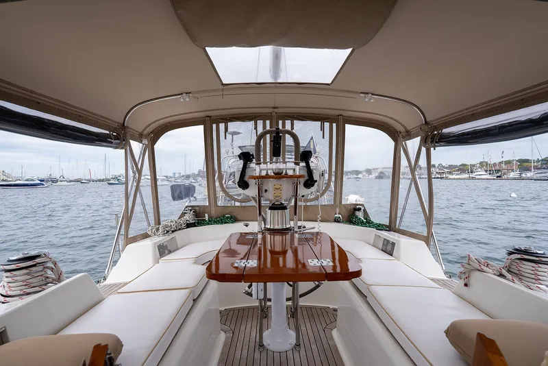 Slide: The Image of Interior view of 2008 Passport Vista 515 Center Cockpit yacht with elegant seating and navigation equipment. - 14