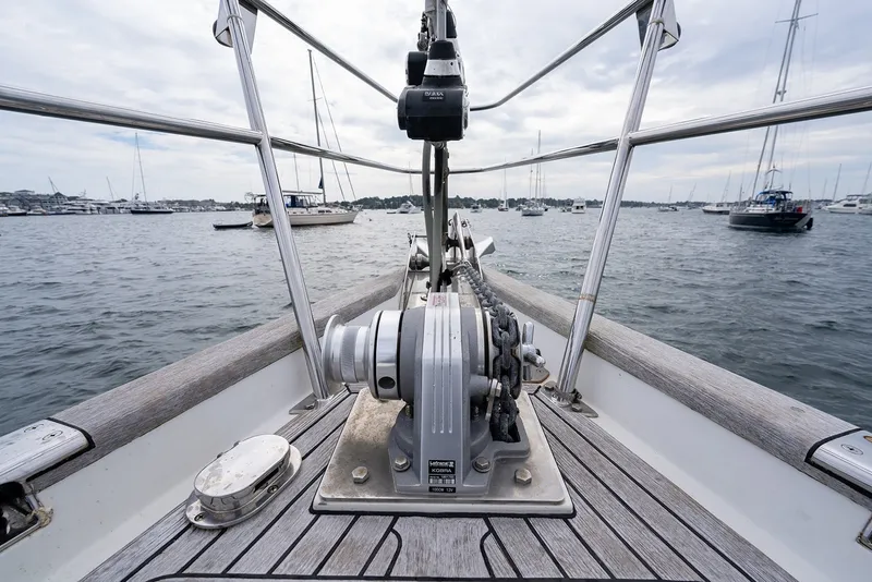 Slide: The Image of Bow view of 2008 Passport Vista 515 Center Cockpit yacht in a marina setting. - 34