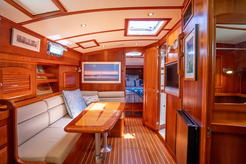 Slide: The Image of Luxurious interior of 2008 Sabre 42 Hard Top Express yacht with wood finish and cozy seating. - 23