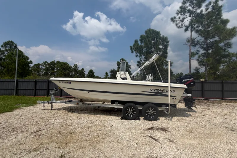 The Image of 1999 Hydra-Sports 20 Bay Sport boat on trailer, parked outdoors. - 14