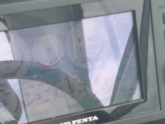Slide: The Image of Close-up of a boat instrument screen displaying various gauge readings. - 10