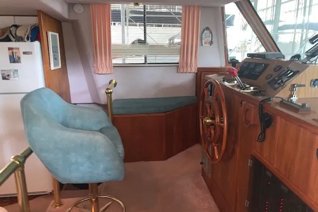 Slide: The Image of Interior of 1993 Harbor Master 450 Coastal Cruiser with helm, seating, and navigation equipment. - 22