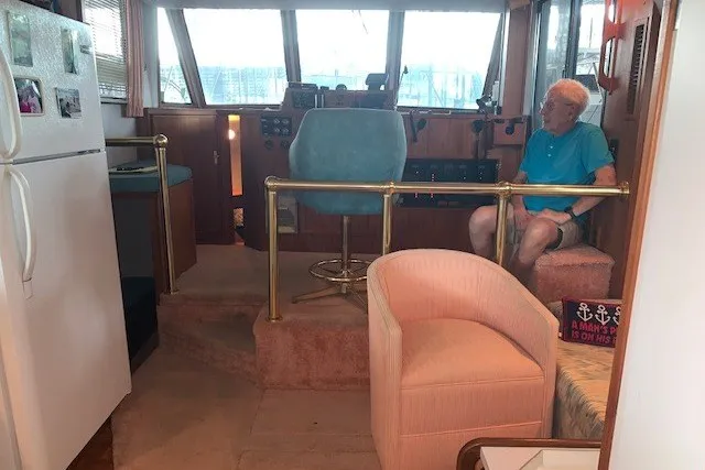 Slide: The Image of Interior of a 1993 Harbor Master 450 Coastal Cruiser with seating and helm station. - 28