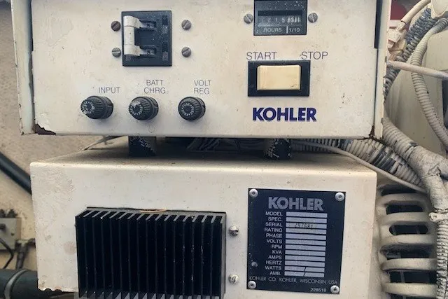 Slide: The Image of Kohler generator control panel on 1993 Harbor Master 450 Coastal Cruiser. - 15