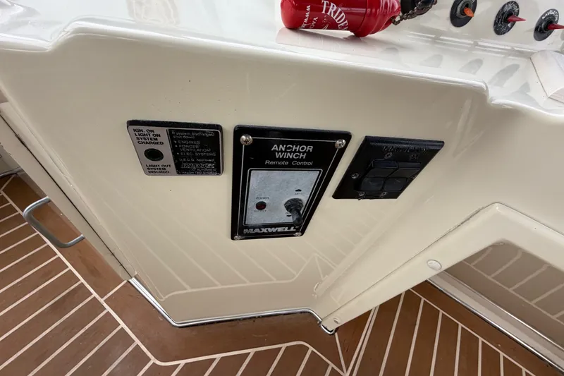 Slide: The Image of Control panel on 1988 Tollycraft 44 Cockpit Motor Yacht with anchor winch remote. - 21
