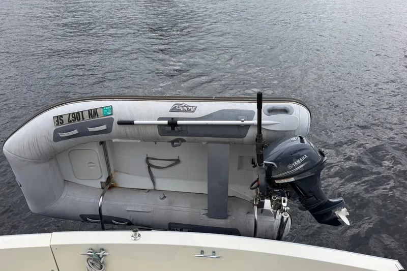 Slide: The Image of Inflatable dinghy with Yamaha motor on Tollycraft 44 Cockpit Motor Yacht, 1988 model. - 12