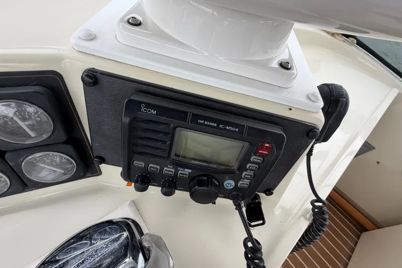 Slide: The Image of ICOM VHF marine radio on 1988 Tollycraft 44 Cockpit Motor Yacht dashboard. - 18
