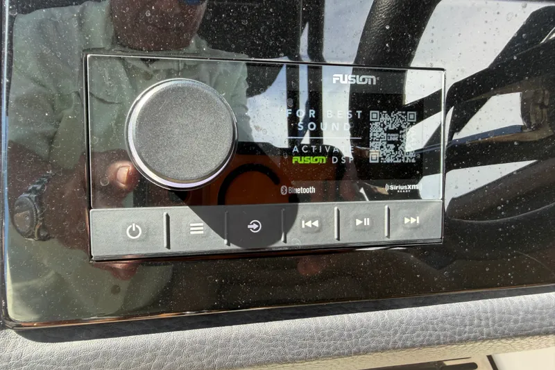 Slide: The Image of 2025 Cobalt R8 Outboard audio system with Fusion interface, featuring Bluetooth and SiriusXM connectivity. - 26