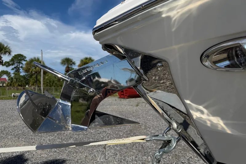 Slide: The Image of Close-up of 2025 Cobalt R8 Outboard boat anchor detail, shiny chrome finish. - 9