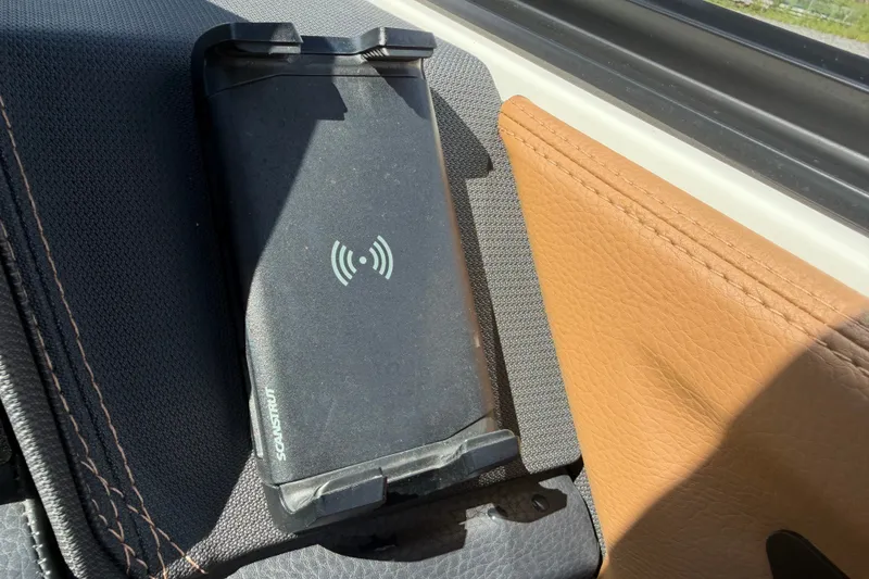 Slide: The Image of Wireless phone charger in 2025 Cobalt R8 Outboard boat interior. - 29