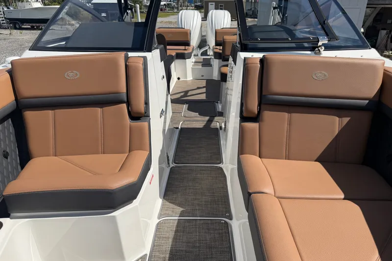 Slide: The Image of Luxurious interior of 2025 Cobalt R8 Outboard boat with tan leather seating. - 17