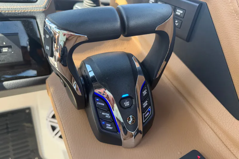 Slide: The Image of Throttle control of 2025 Cobalt R8 Outboard boat, featuring modern design and functionality. - 24