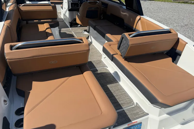 Slide: The Image of Luxurious interior of 2025 Cobalt R8 Outboard boat with tan leather seating. - 12