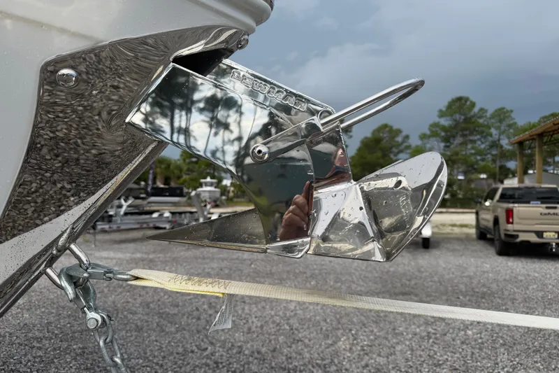 Slide: The Image of 2025 Cobalt R8 Outboard boat anchor detail with reflective chrome finish. - 8