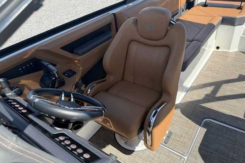 Slide: The Image of Luxurious interior of 2025 Cobalt R8 Outboard boat with plush seating and modern controls. - 15