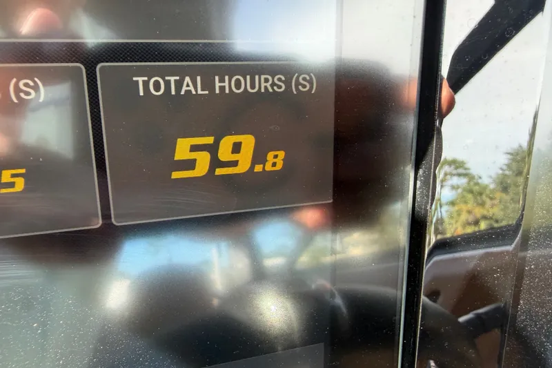 Slide: The Image of Cobalt R8 Outboard 2025 display showing 59.8 total hours. - 30