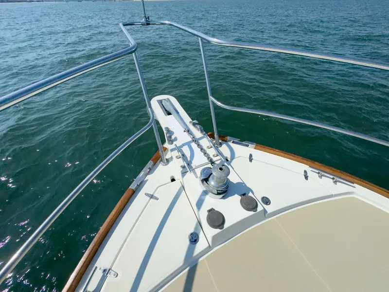 Slide: The Image of Bow view of a 2002 Sabre 36 Express on the water. - 39
