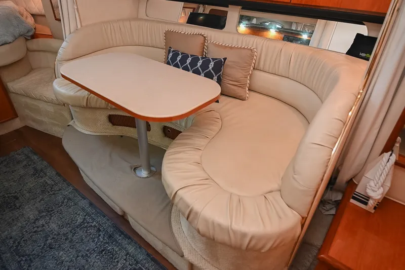 Slide: The Image of Luxurious interior seating area of 2001 Sea Ray 340 Sundancer yacht. - 26
