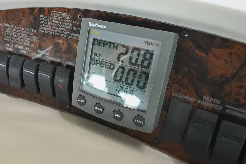 Slide: The Image of Raytheon ST60 Tridata display on 2001 Sea Ray 340 Sundancer boat dashboard. - 22