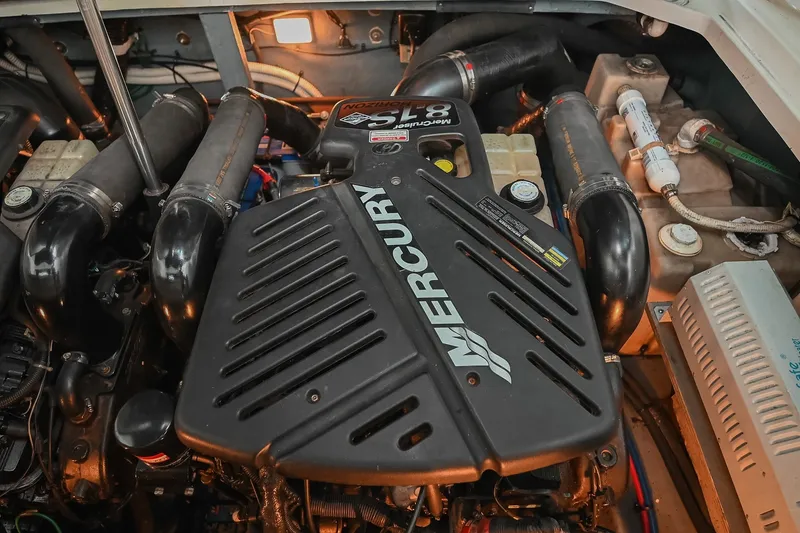 Slide: The Image of Engine compartment of a 2001 Sea Ray 340 Sundancer with Mercury 5.7L engine. - 46