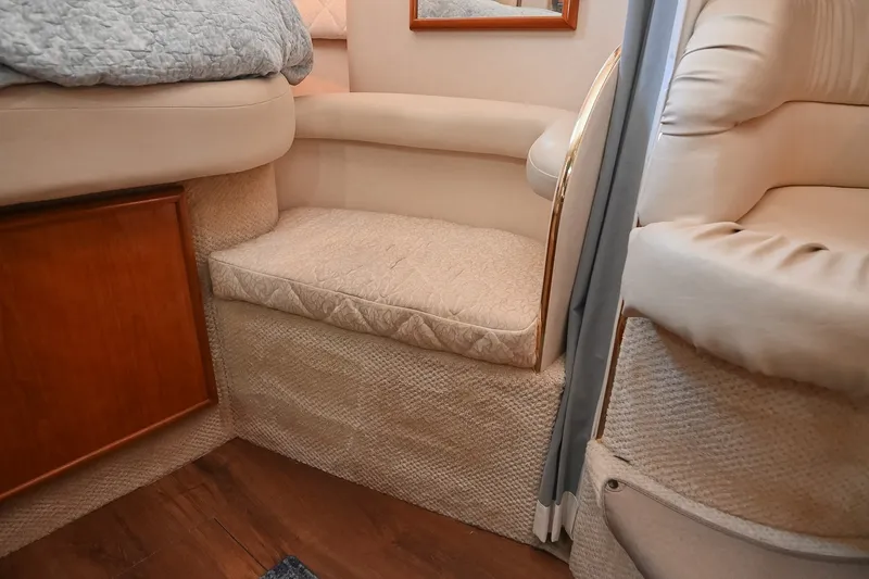 Slide: The Image of Interior of 2001 Sea Ray 340 Sundancer, featuring cozy seating and elegant design. - 33