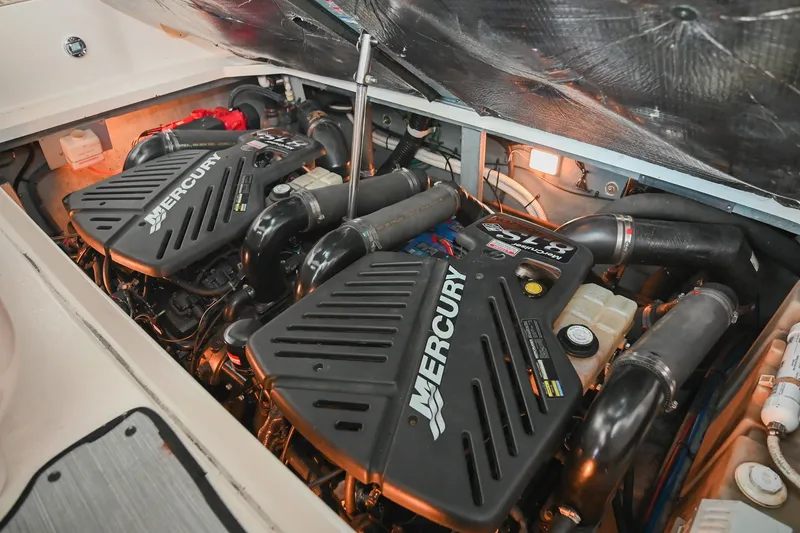 Slide: The Image of Engine compartment of a 2001 Sea Ray 340 Sundancer with twin Mercury engines. - 45