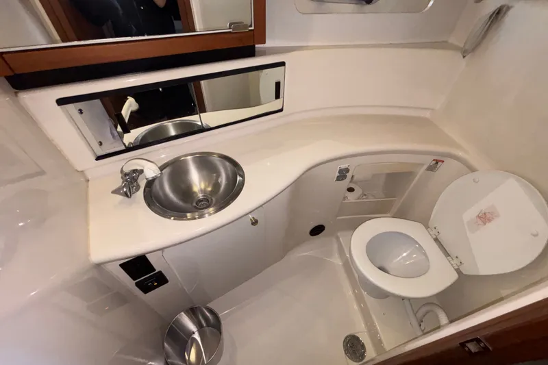 Slide: The Image of Bathroom interior of 1996 Bayliner 3587 Motoryacht with sink and toilet. - 14