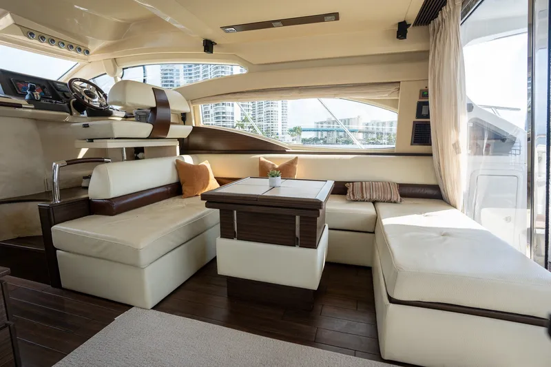 Slide: The Image of Luxurious interior of a 2014 Azimut 48 yacht with elegant seating and helm station. - 29