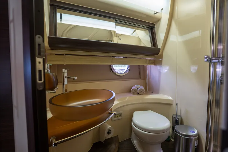 Slide: The Image of Luxurious bathroom interior of 2014 Azimut 48 yacht with modern fixtures and elegant design. - 13