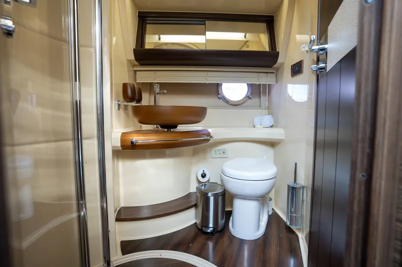 Slide: The Image of Luxurious bathroom interior of 2014 Azimut 48 yacht with modern fixtures and wooden accents. - 16